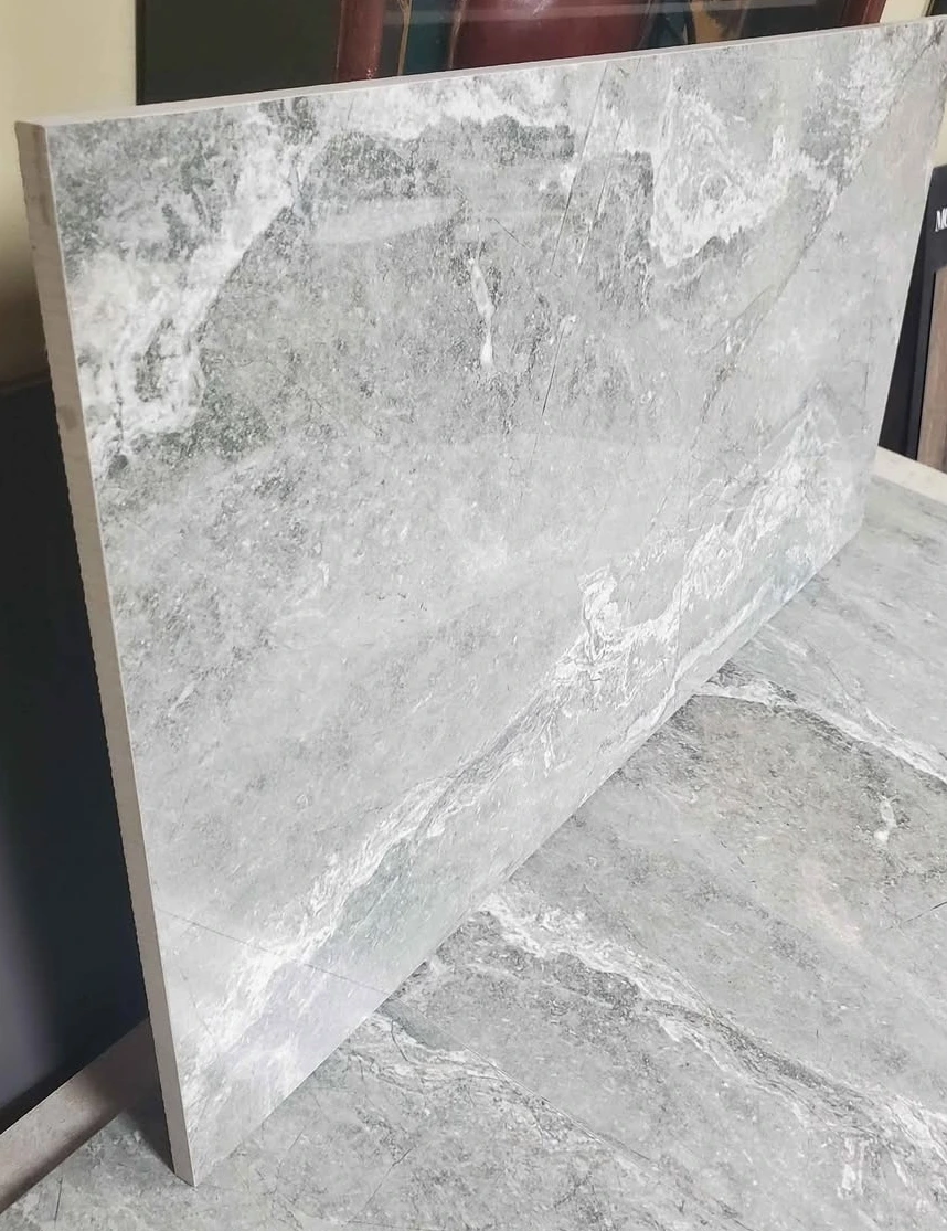 A photo of 12 x 24 medium grey marble look tile