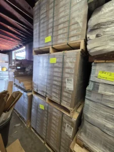 A photo of several pallets of closeout flooring