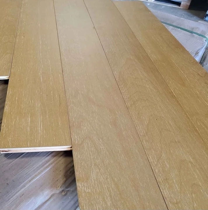 A photo of Honey colored engineered hardwood flooring